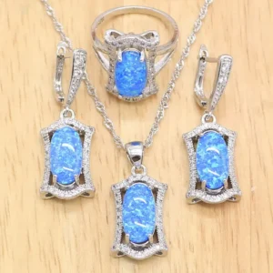 925 Sterling Silver Set, gold-plated with Silver and adorned with Geomertric Blue Opal stones.